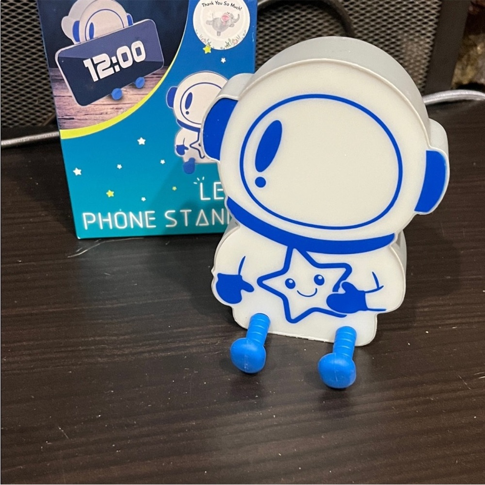 Blue and White Astronaut LED Phone Stand